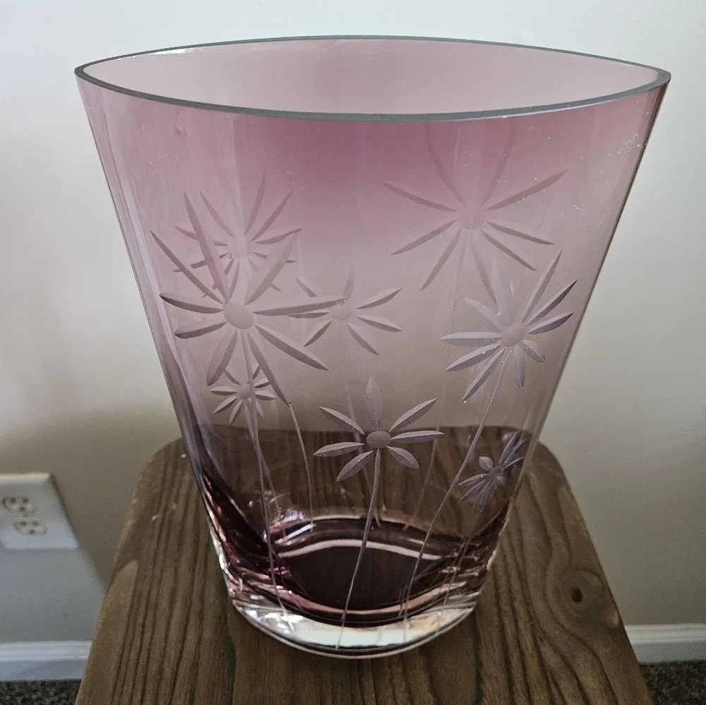 Elegant oval clear cut purple vase.
